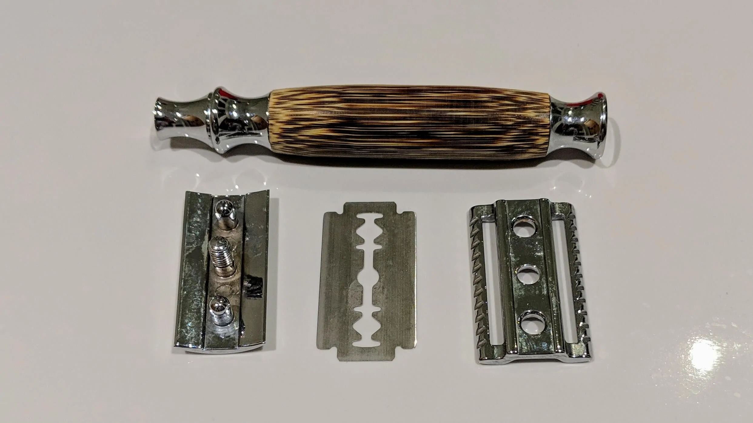 Disassembled double edge safety razor