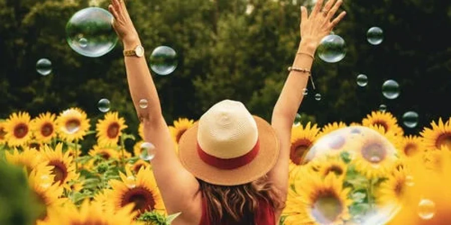 woman-in-sunflower-field-pexels